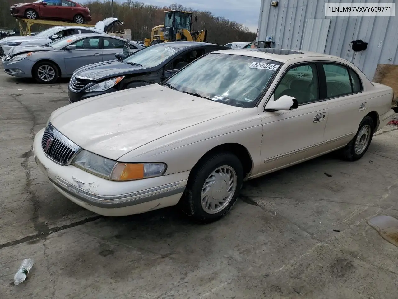 1997 Lincoln Continental VIN: 1LNLM97VXVY609771 Lot: 52992085