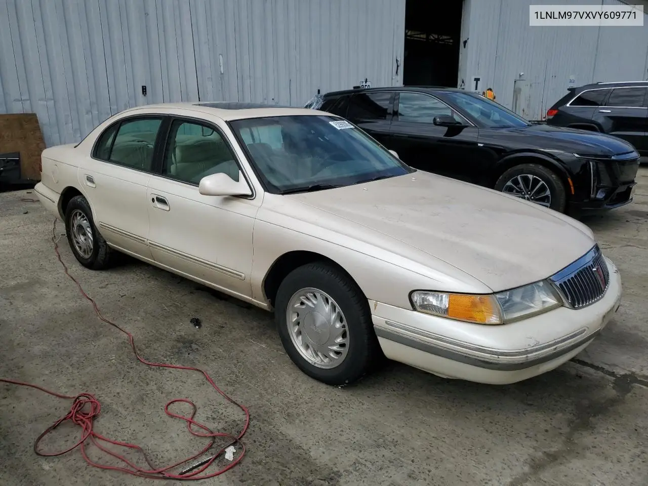 1997 Lincoln Continental VIN: 1LNLM97VXVY609771 Lot: 52992085