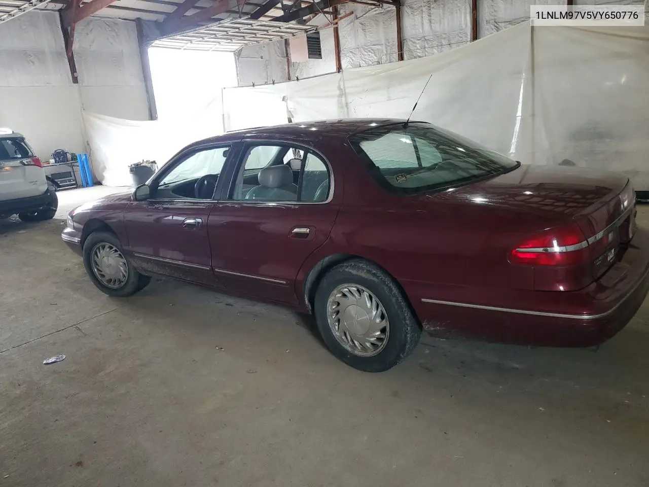 1997 Lincoln Continental VIN: 1LNLM97V5VY650776 Lot: 62645445