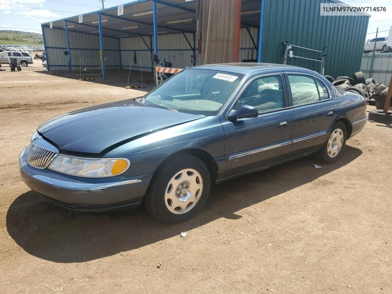 1998 Lincoln Continental VIN: 1LNFM97V2WY714576 Lot: 56664605