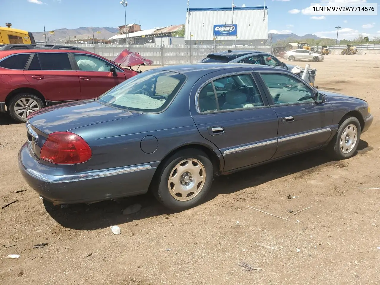 1998 Lincoln Continental VIN: 1LNFM97V2WY714576 Lot: 56664605