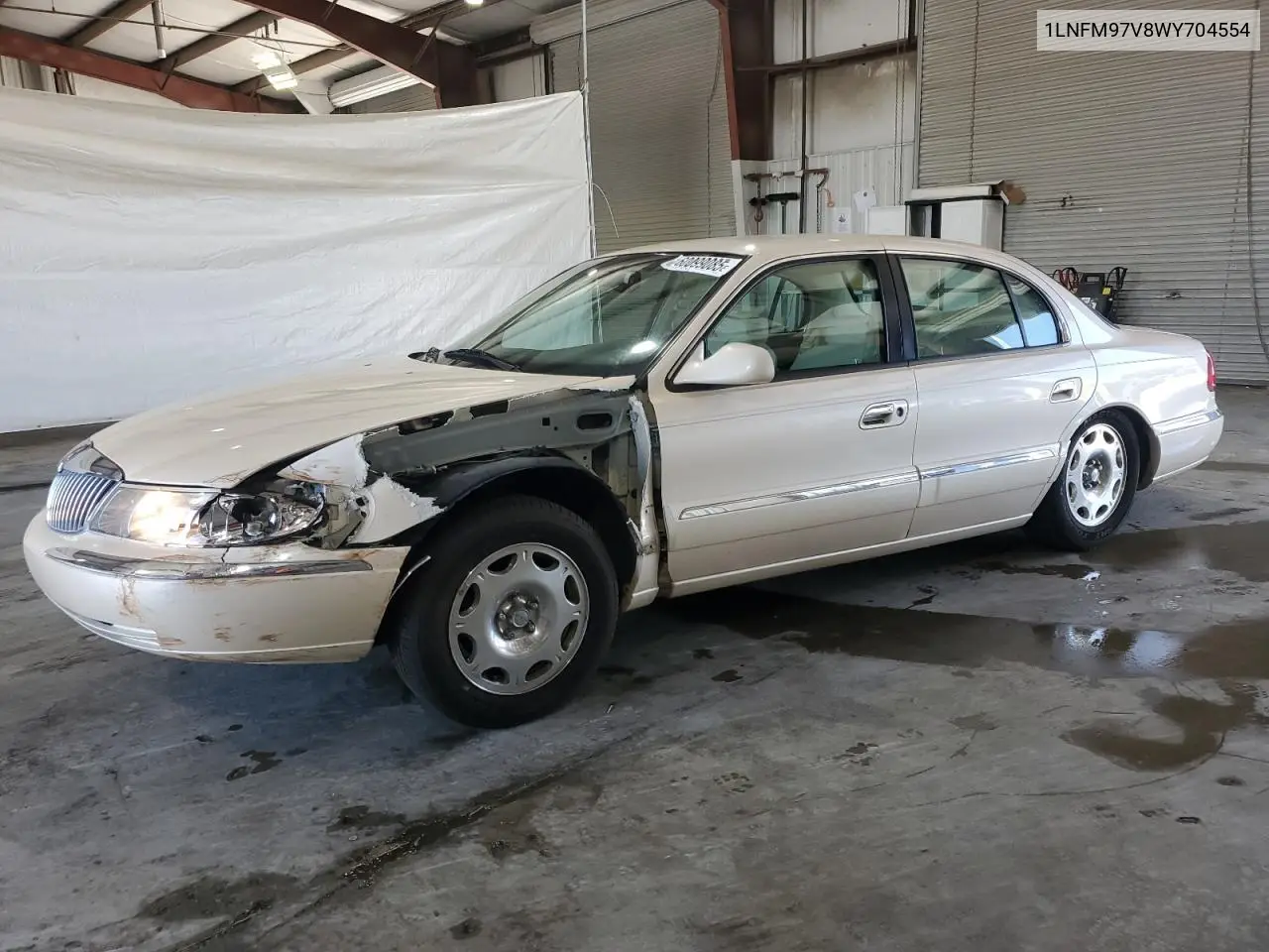 1998 Lincoln Continental VIN: 1LNFM97V8WY704554 Lot: 60099085