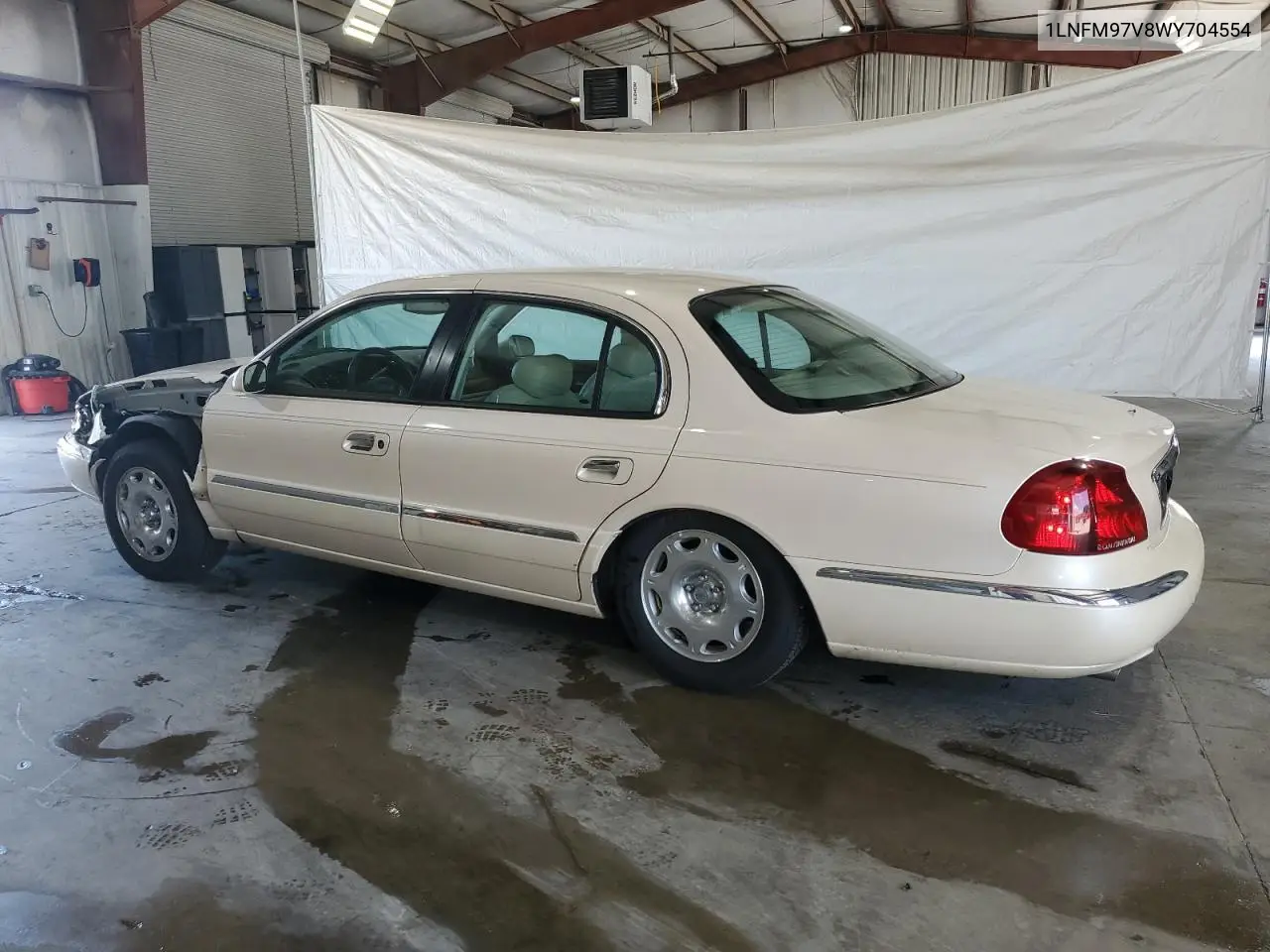 1998 Lincoln Continental VIN: 1LNFM97V8WY704554 Lot: 60099085