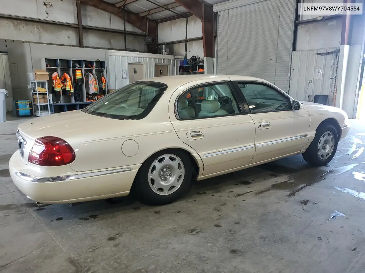 1998 Lincoln Continental VIN: 1LNFM97V8WY704554 Lot: 60099085