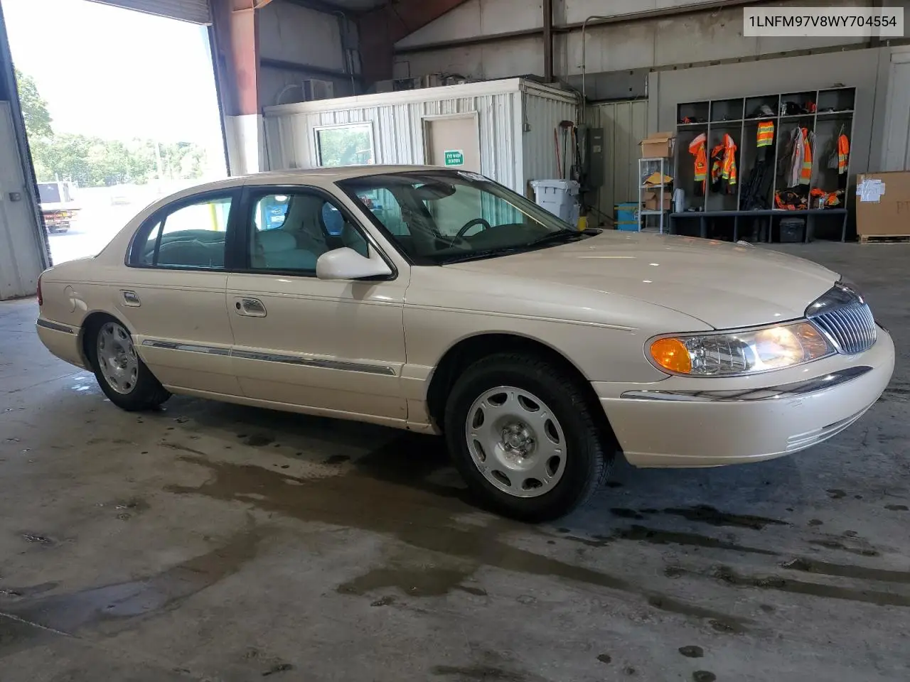 1998 Lincoln Continental VIN: 1LNFM97V8WY704554 Lot: 60099085