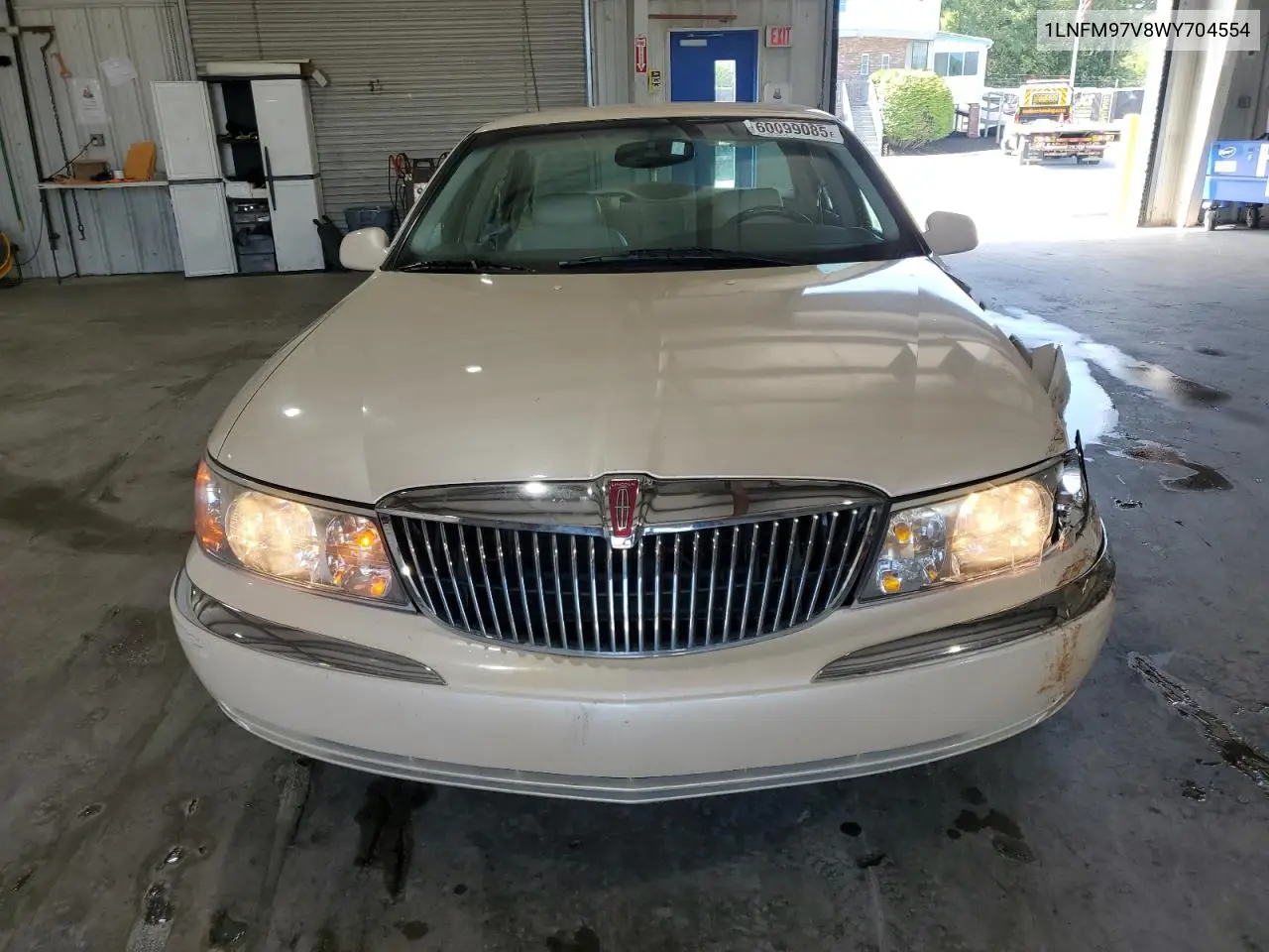1998 Lincoln Continental VIN: 1LNFM97V8WY704554 Lot: 60099085