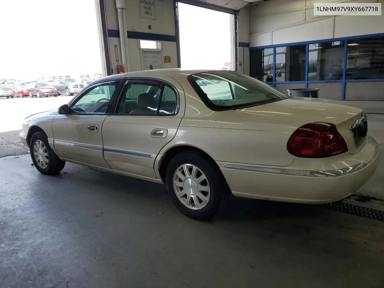 1999 Lincoln Continental VIN: 1LNHM97V9XY667718 Lot: 54892675
