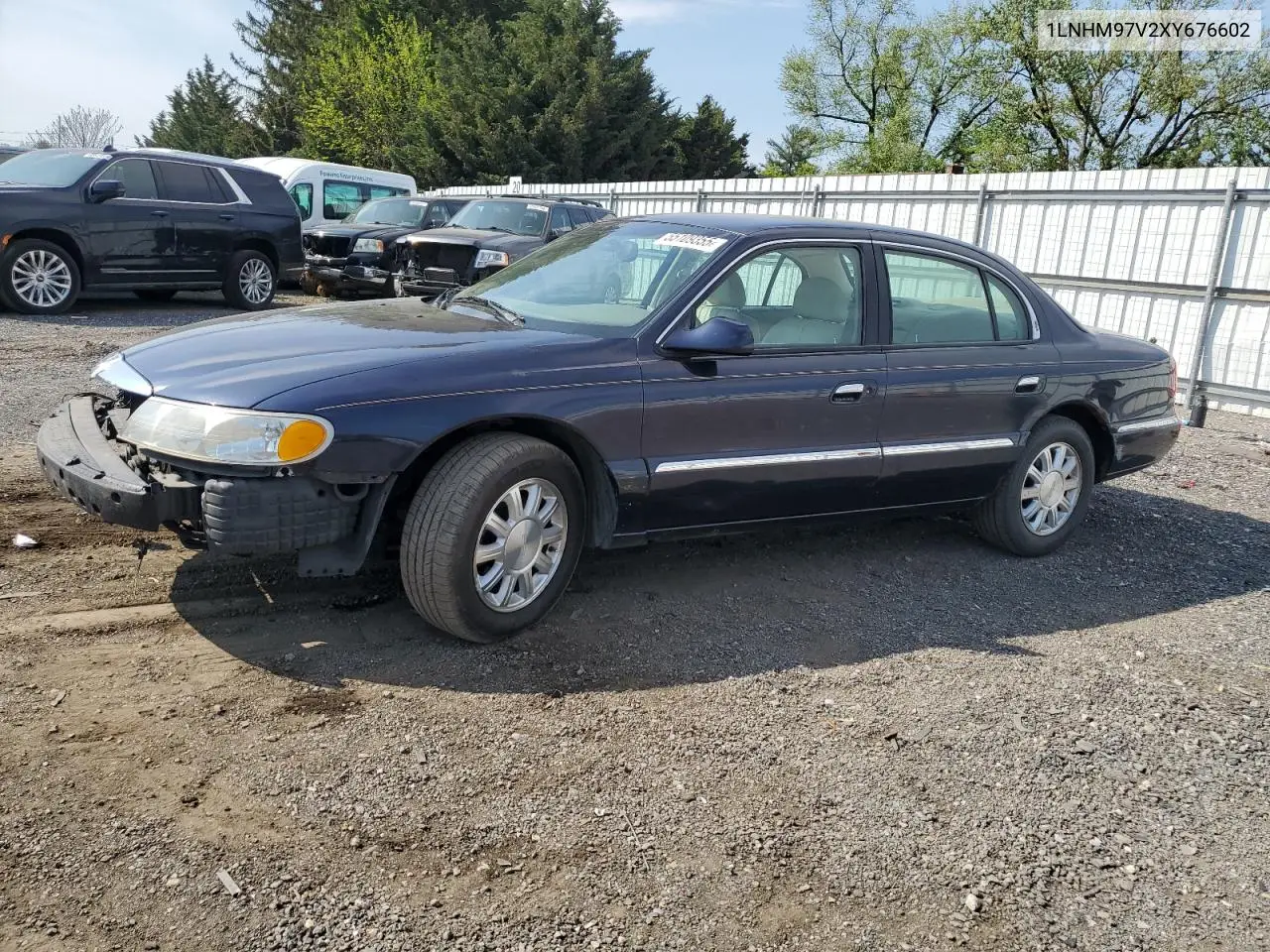 1999 Lincoln Continental VIN: 1LNHM97V2XY676602 Lot: 55109355