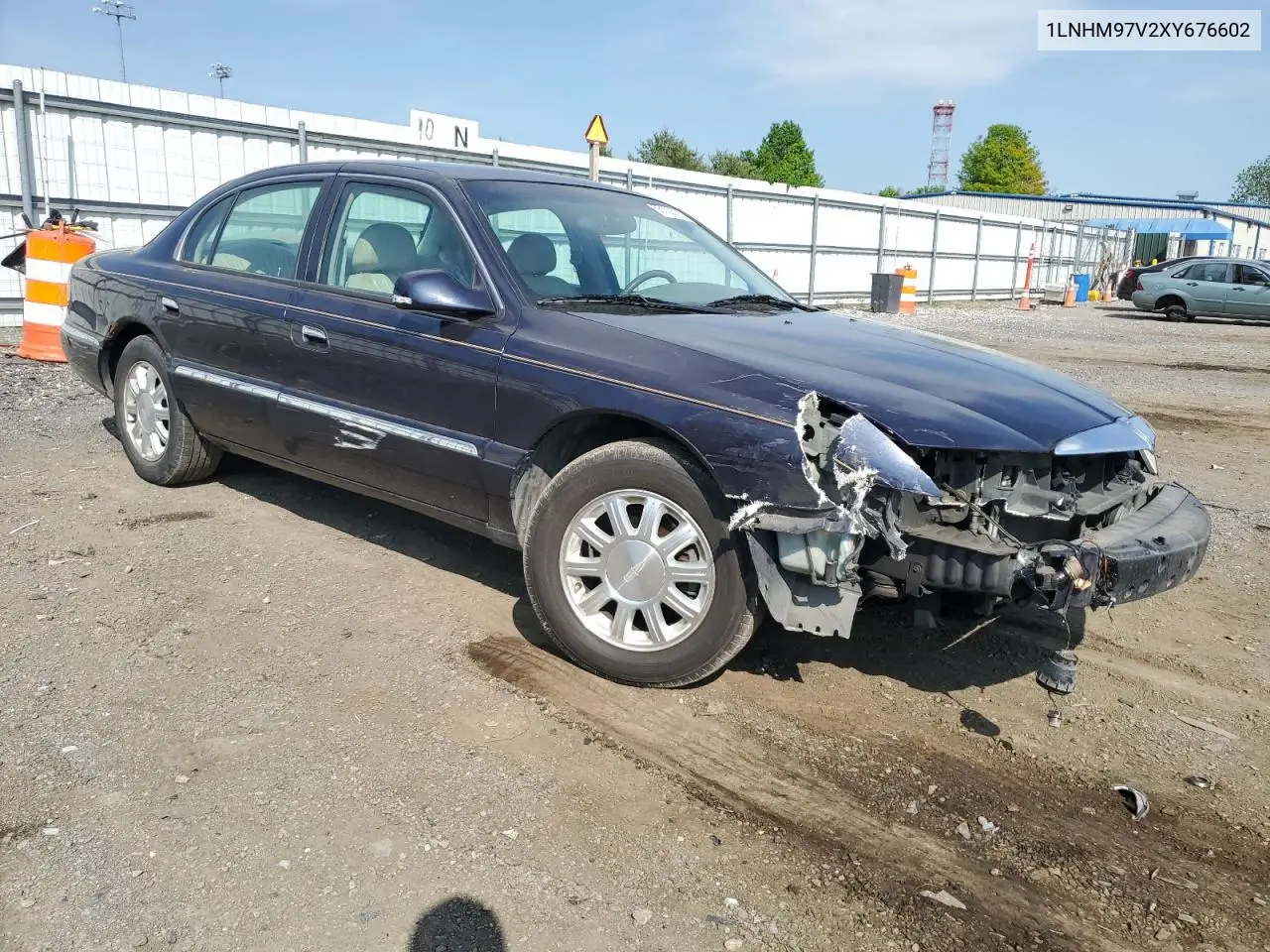 1999 Lincoln Continental VIN: 1LNHM97V2XY676602 Lot: 55109355