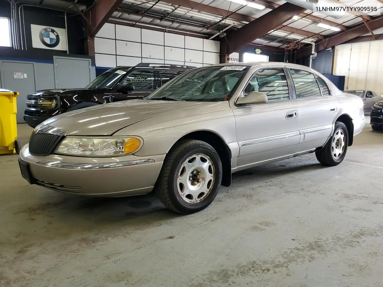 2000 Lincoln Continental VIN: 1LNHM97V1YY909595 Lot: 63145915