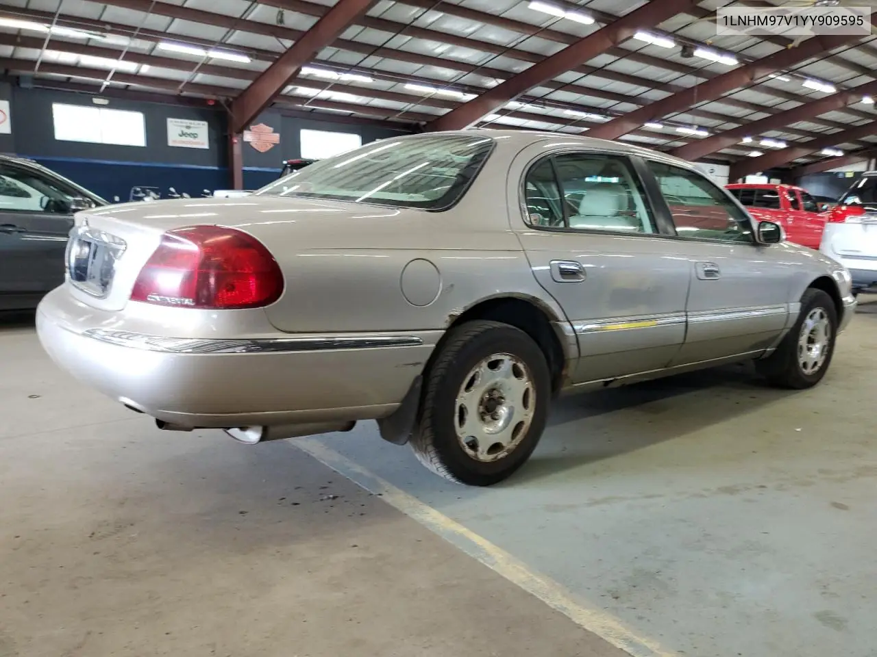2000 Lincoln Continental VIN: 1LNHM97V1YY909595 Lot: 63145915