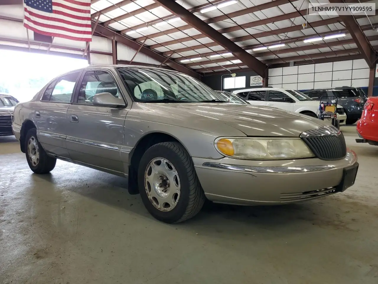 2000 Lincoln Continental VIN: 1LNHM97V1YY909595 Lot: 63145915
