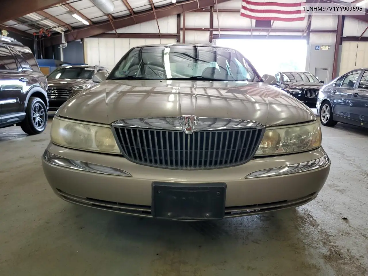 2000 Lincoln Continental VIN: 1LNHM97V1YY909595 Lot: 63145915
