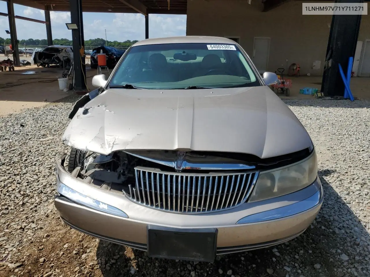 2001 Lincoln Continental VIN: 1LNHM97V71Y711271 Lot: 64003305