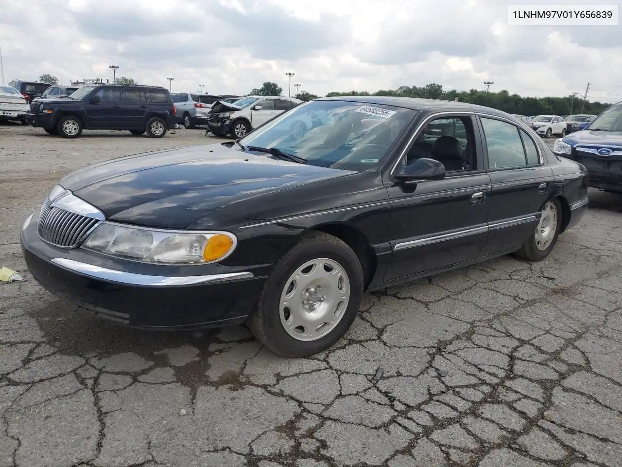 2001 Lincoln Continental VIN: 1LNHM97V01Y656839 Lot: 64583255