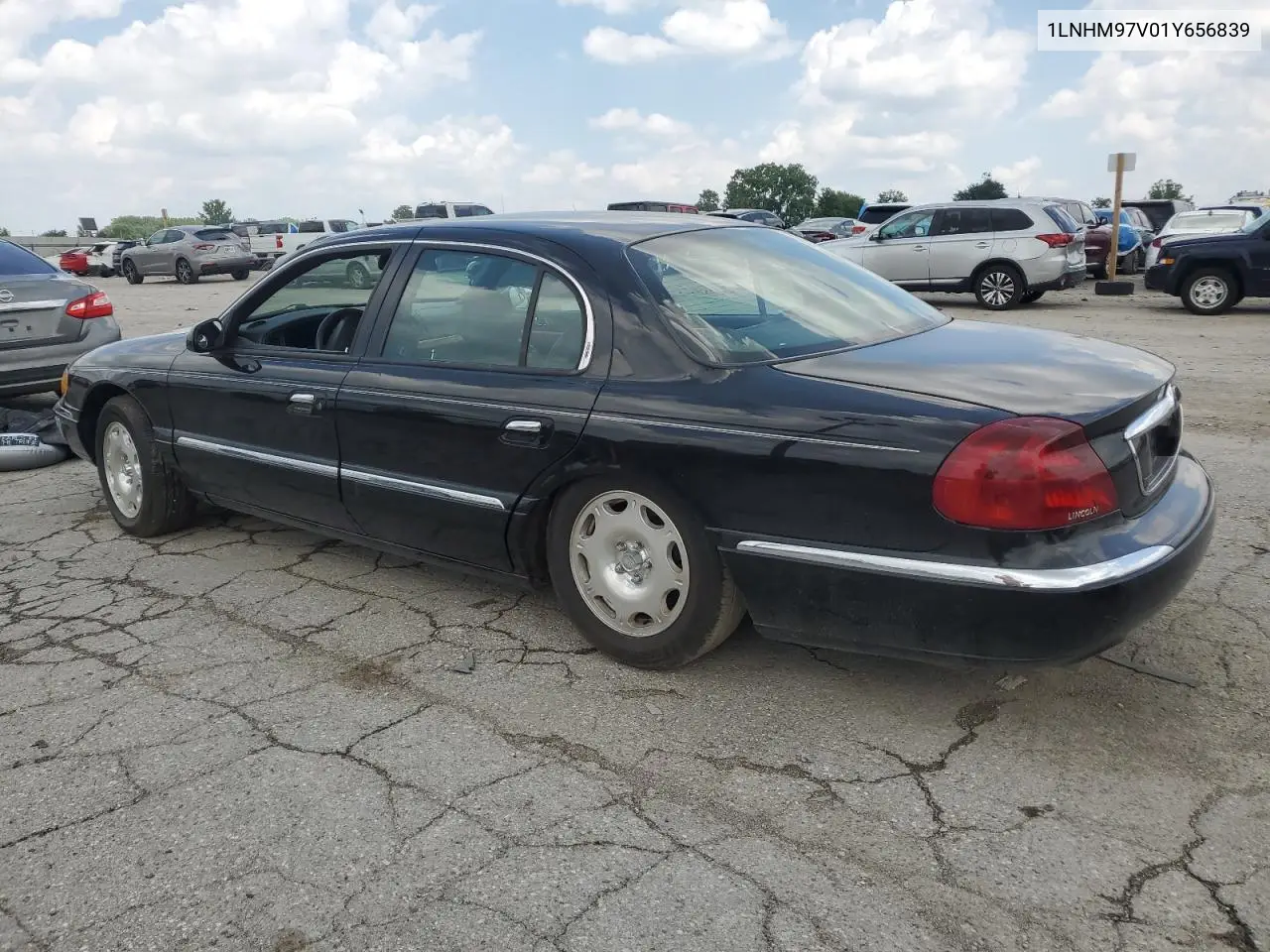 2001 Lincoln Continental VIN: 1LNHM97V01Y656839 Lot: 64583255