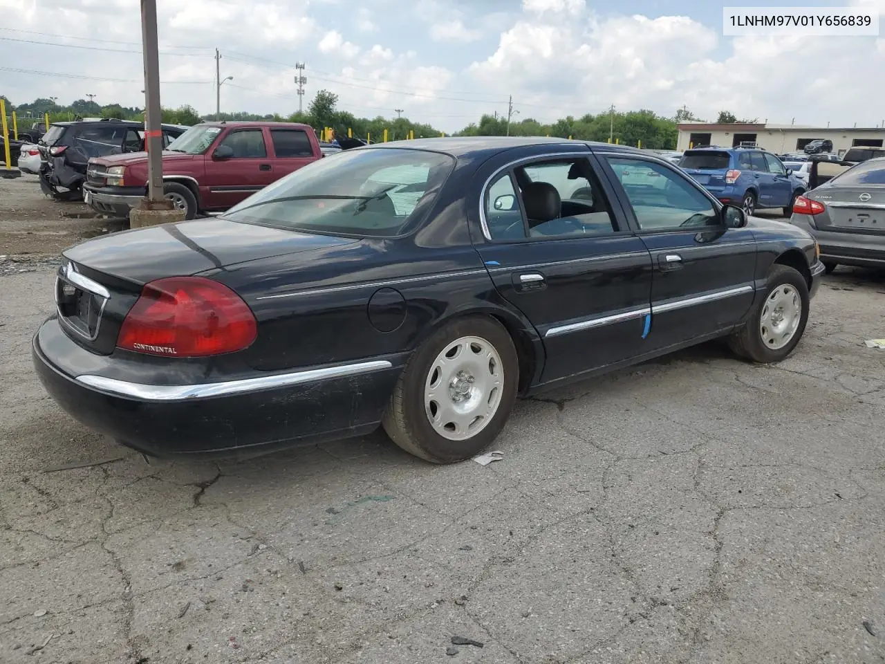 2001 Lincoln Continental VIN: 1LNHM97V01Y656839 Lot: 64583255