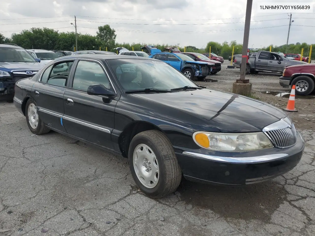 2001 Lincoln Continental VIN: 1LNHM97V01Y656839 Lot: 64583255