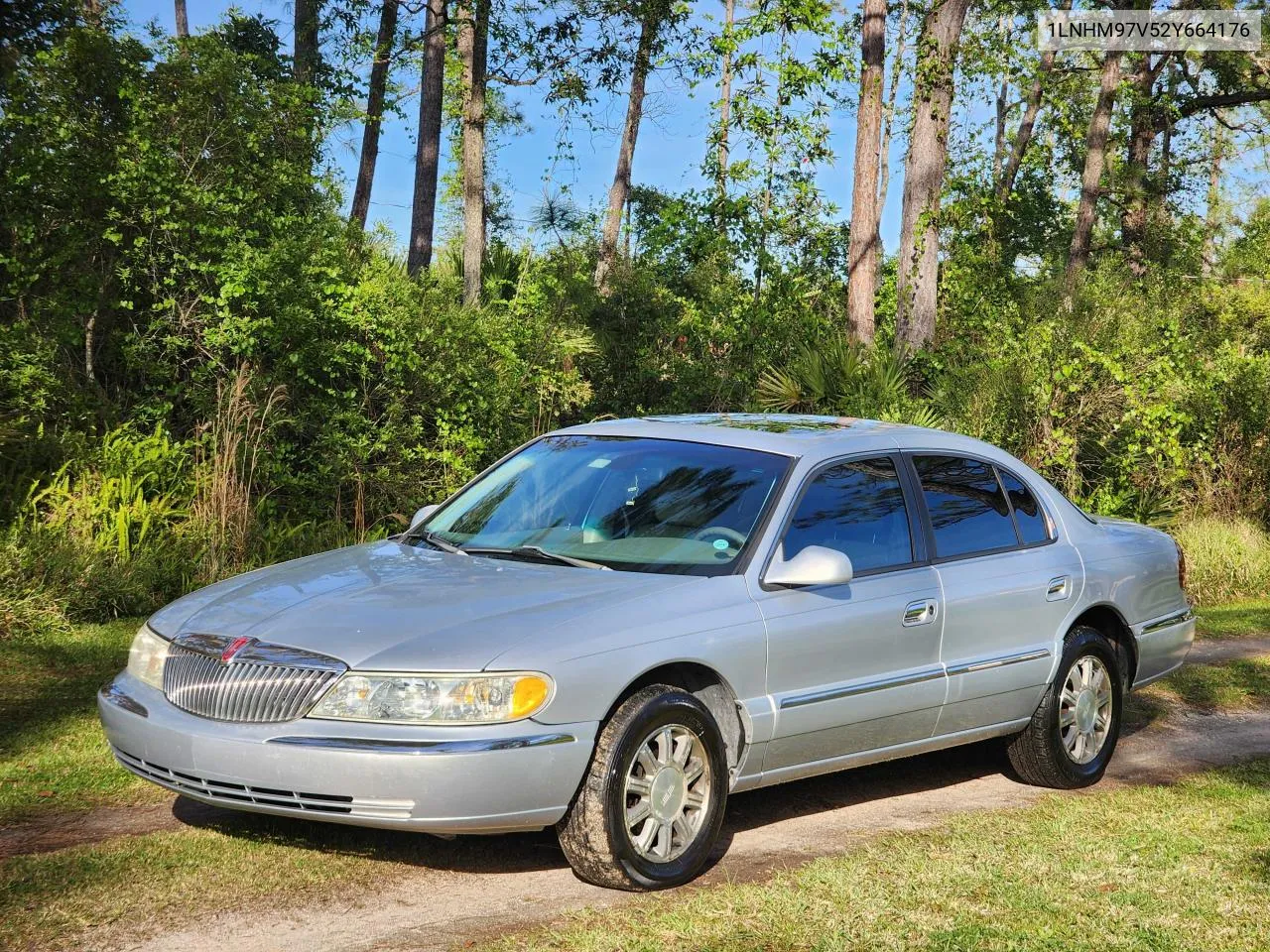 2002 Lincoln Continental VIN: 1LNHM97V52Y664176 Lot: 73327774