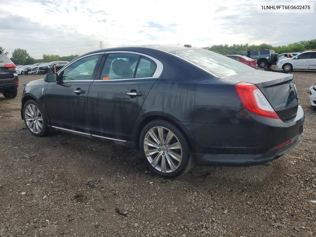2014 Lincoln Mks VIN: 1LNHL9FT6EG602475 Lot: 64061625