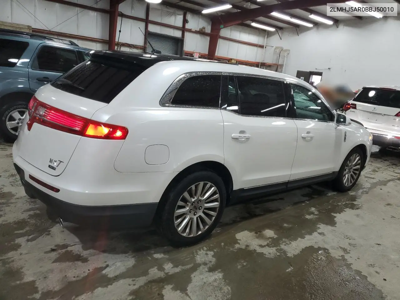 2011 Lincoln Mkt VIN: 2LMHJ5AR0BBJ50010 Lot: 52117615