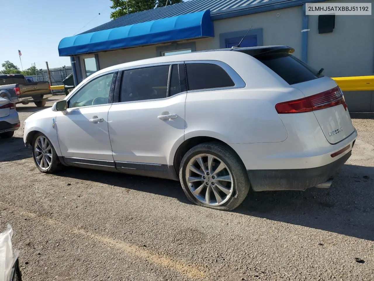 2011 Lincoln Mkt VIN: 2LMHJ5ATXBBJ51192 Lot: 55723995