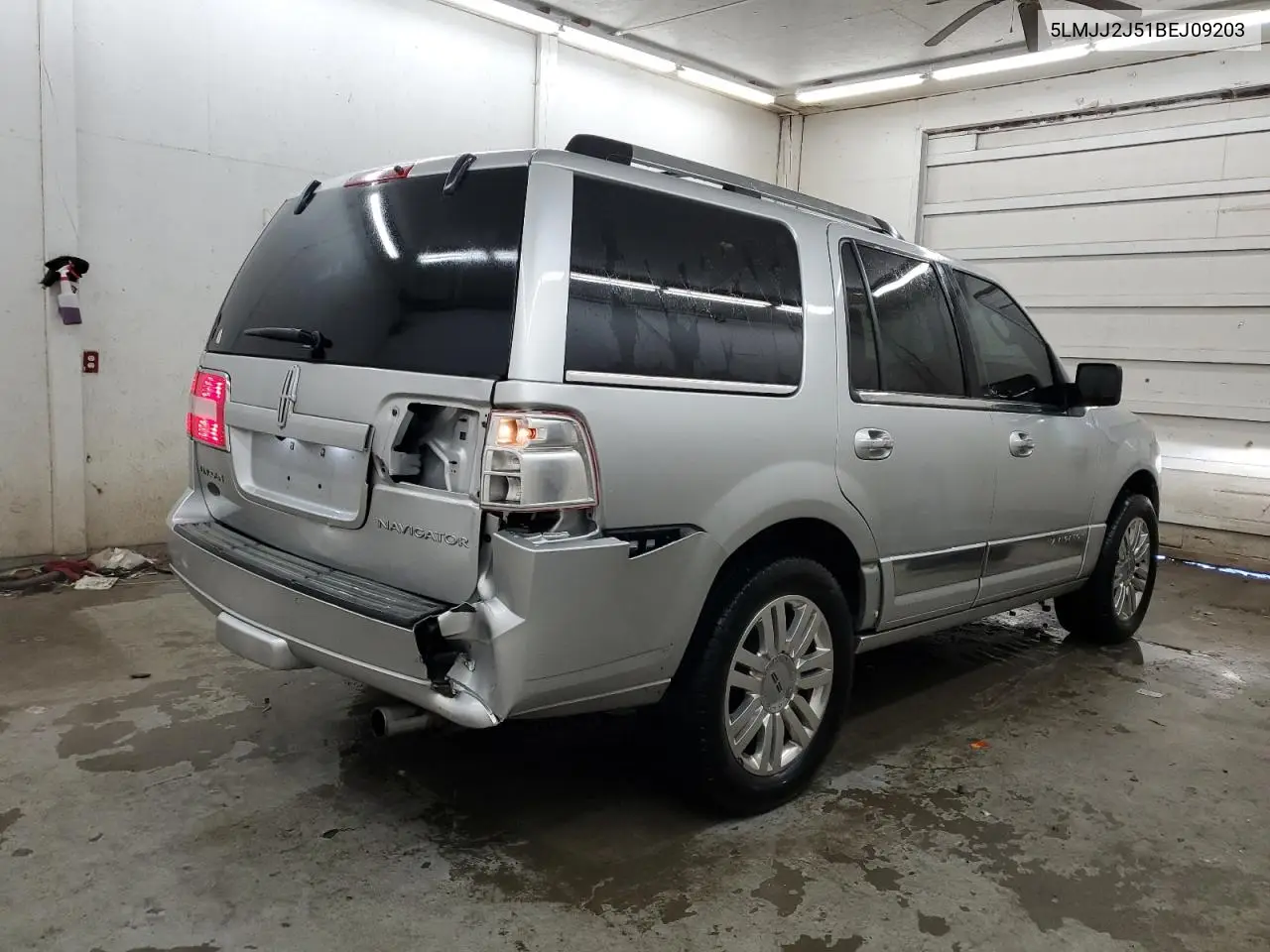 2011 Lincoln Navigator VIN: 5LMJJ2J51BEJ09203 Lot: 52627685