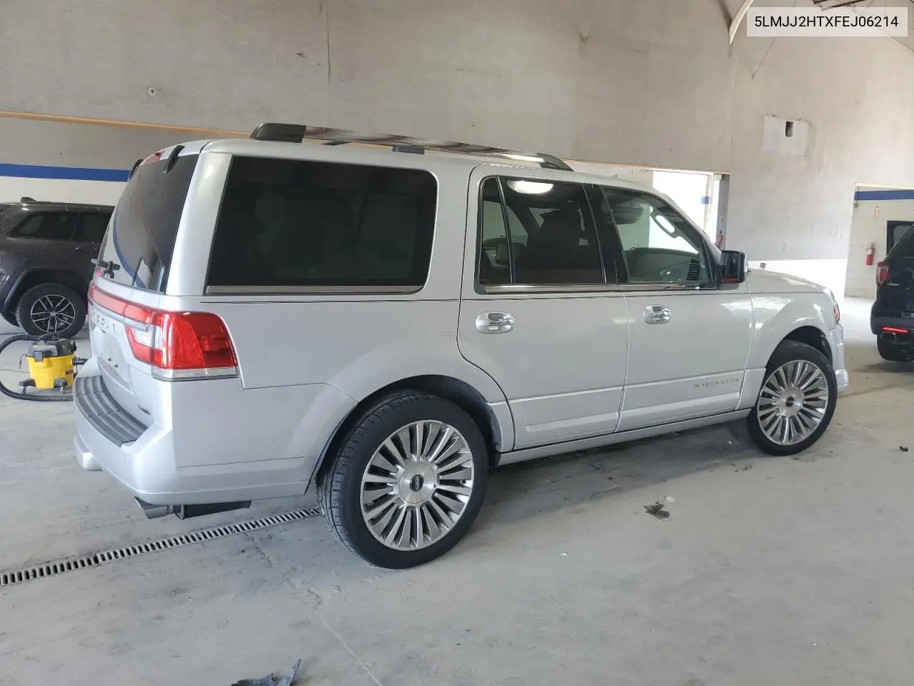 2015 Lincoln Navigator VIN: 5LMJJ2HTXFEJ06214 Lot: 62408995