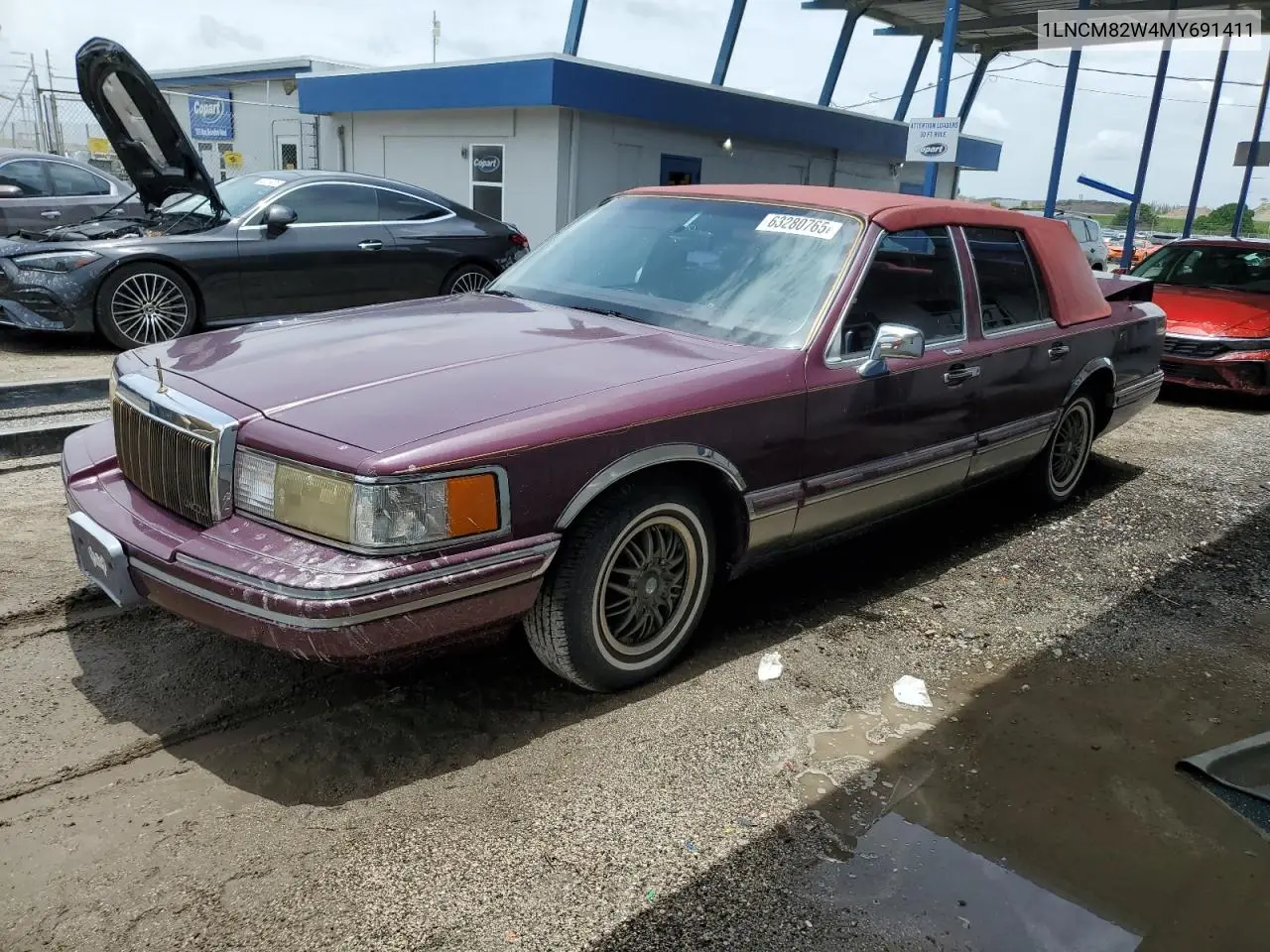 1991 Lincoln Town Car Signature VIN: 1LNCM82W4MY691411 Lot: 63280765
