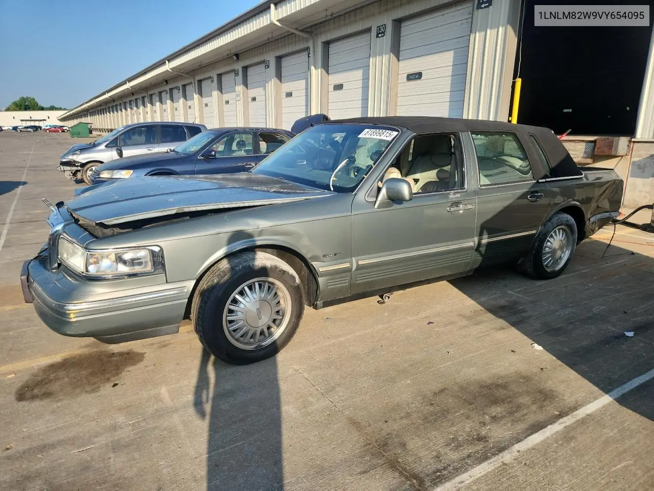1997 Lincoln Town Car Signature VIN: 1LNLM82W9VY654095 Lot: 61899815
