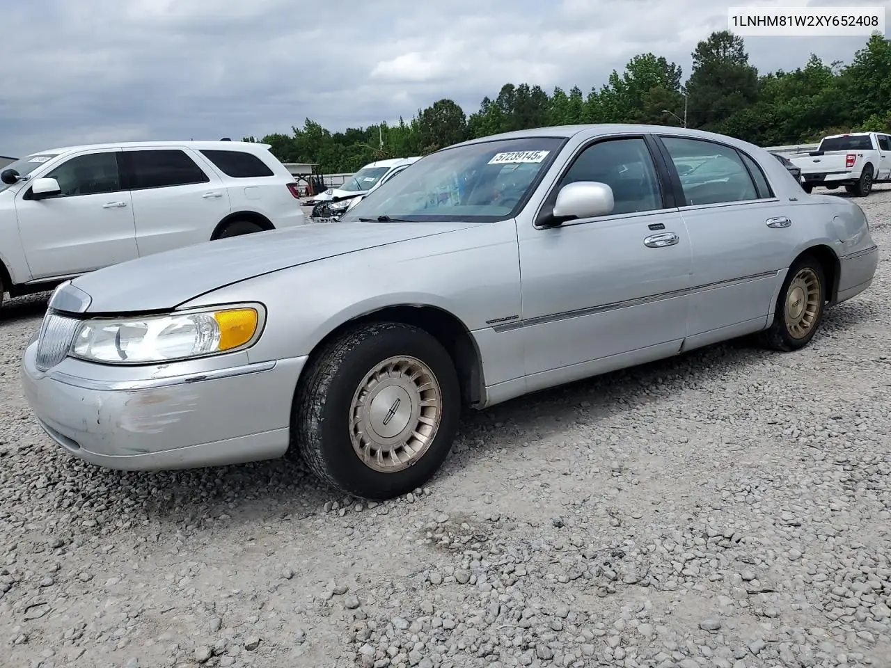 1999 Lincoln Town Car Executive VIN: 1LNHM81W2XY652408 Lot: 57239145