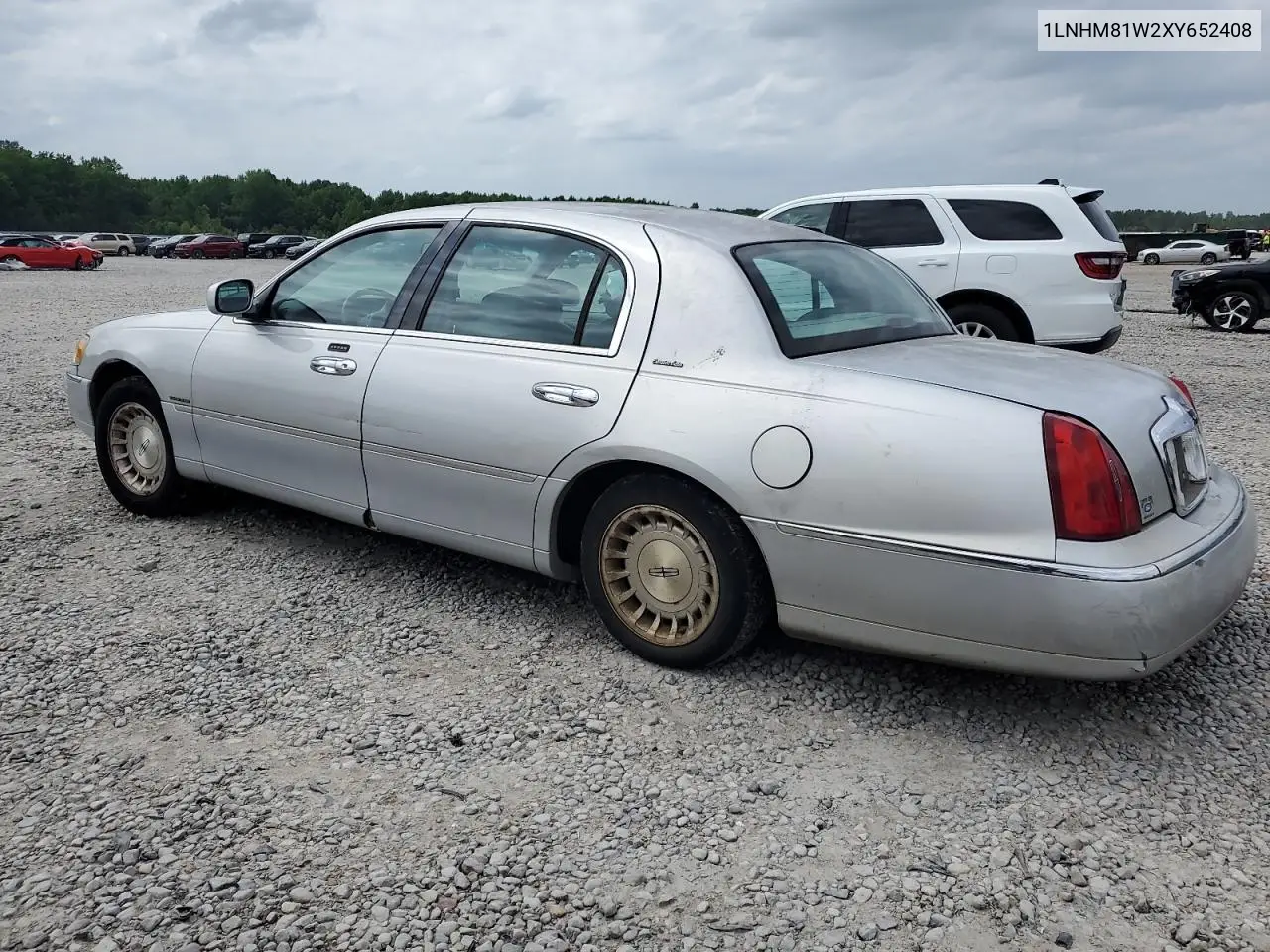 1999 Lincoln Town Car Executive VIN: 1LNHM81W2XY652408 Lot: 57239145