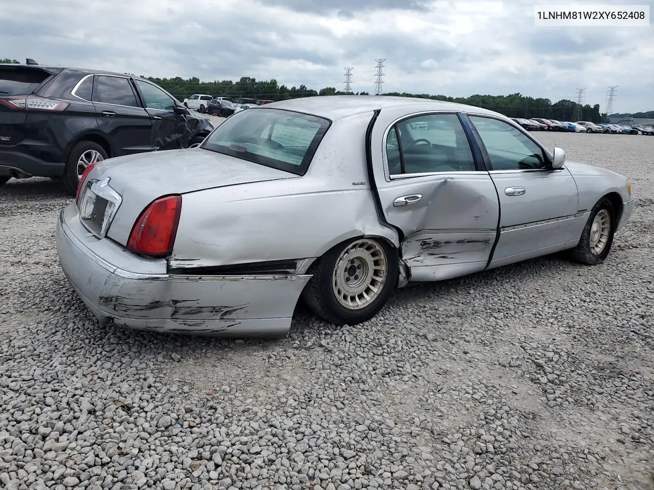 1999 Lincoln Town Car Executive VIN: 1LNHM81W2XY652408 Lot: 57239145