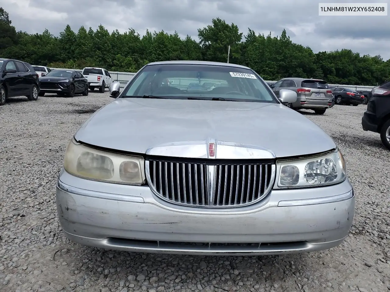 1999 Lincoln Town Car Executive VIN: 1LNHM81W2XY652408 Lot: 57239145