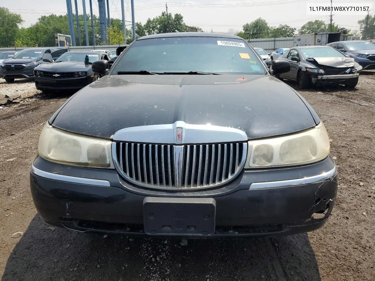 1999 Lincoln Town Car Executive VIN: 1L1FM81W8XY710157 Lot: 59804965