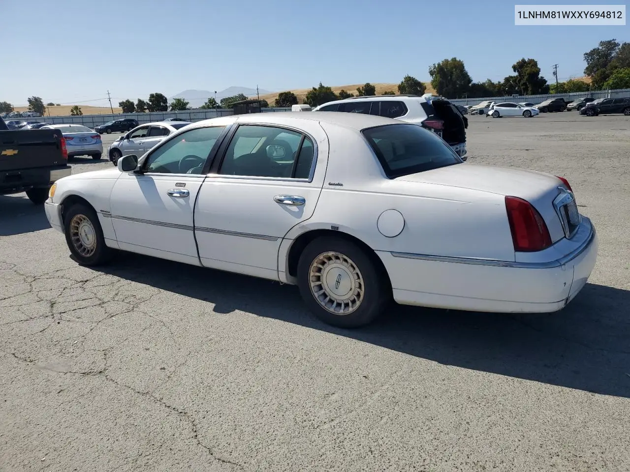 1999 Lincoln Town Car Executive VIN: 1LNHM81WXXY694812 Lot: 61448815