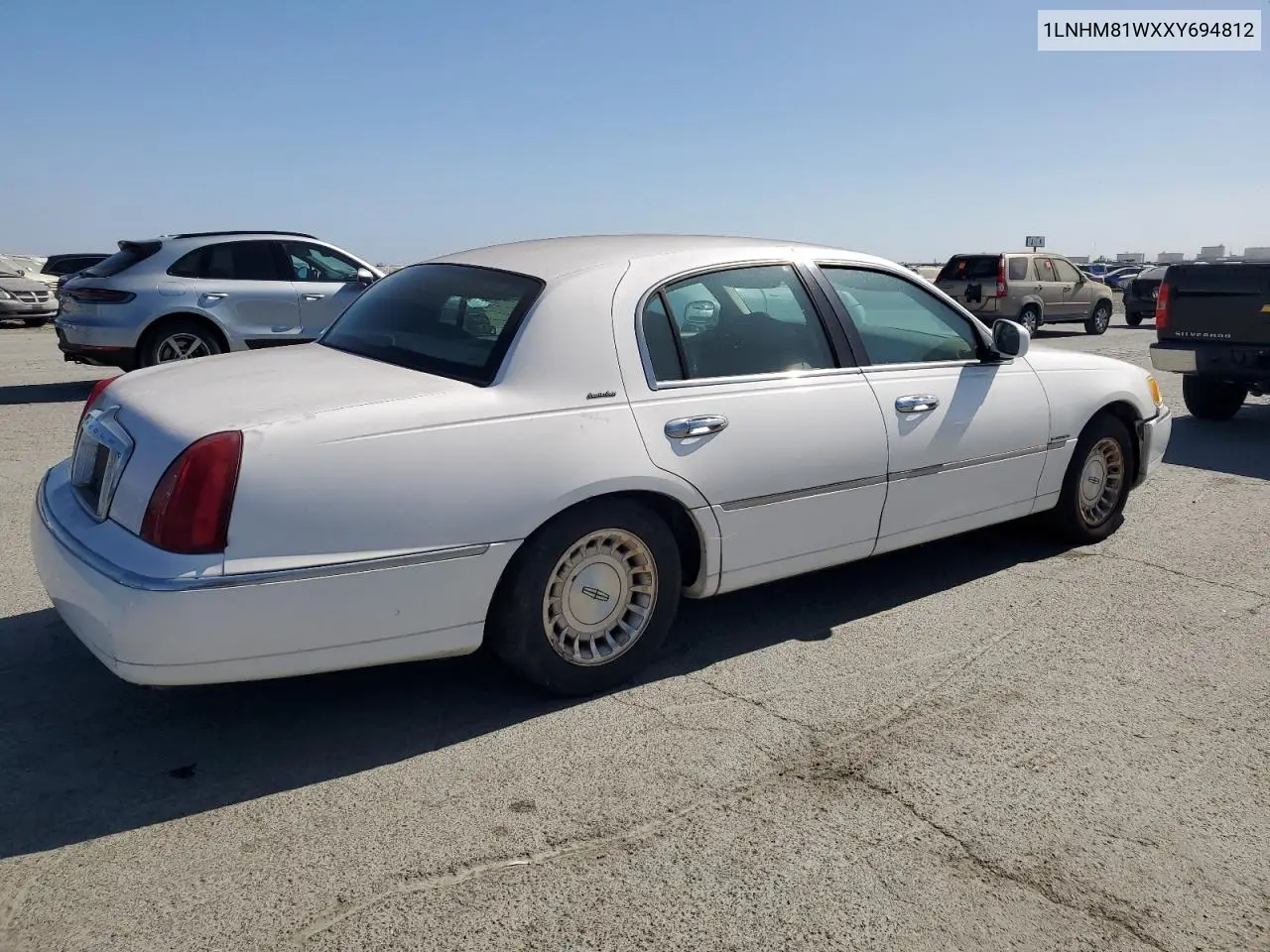1999 Lincoln Town Car Executive VIN: 1LNHM81WXXY694812 Lot: 61448815