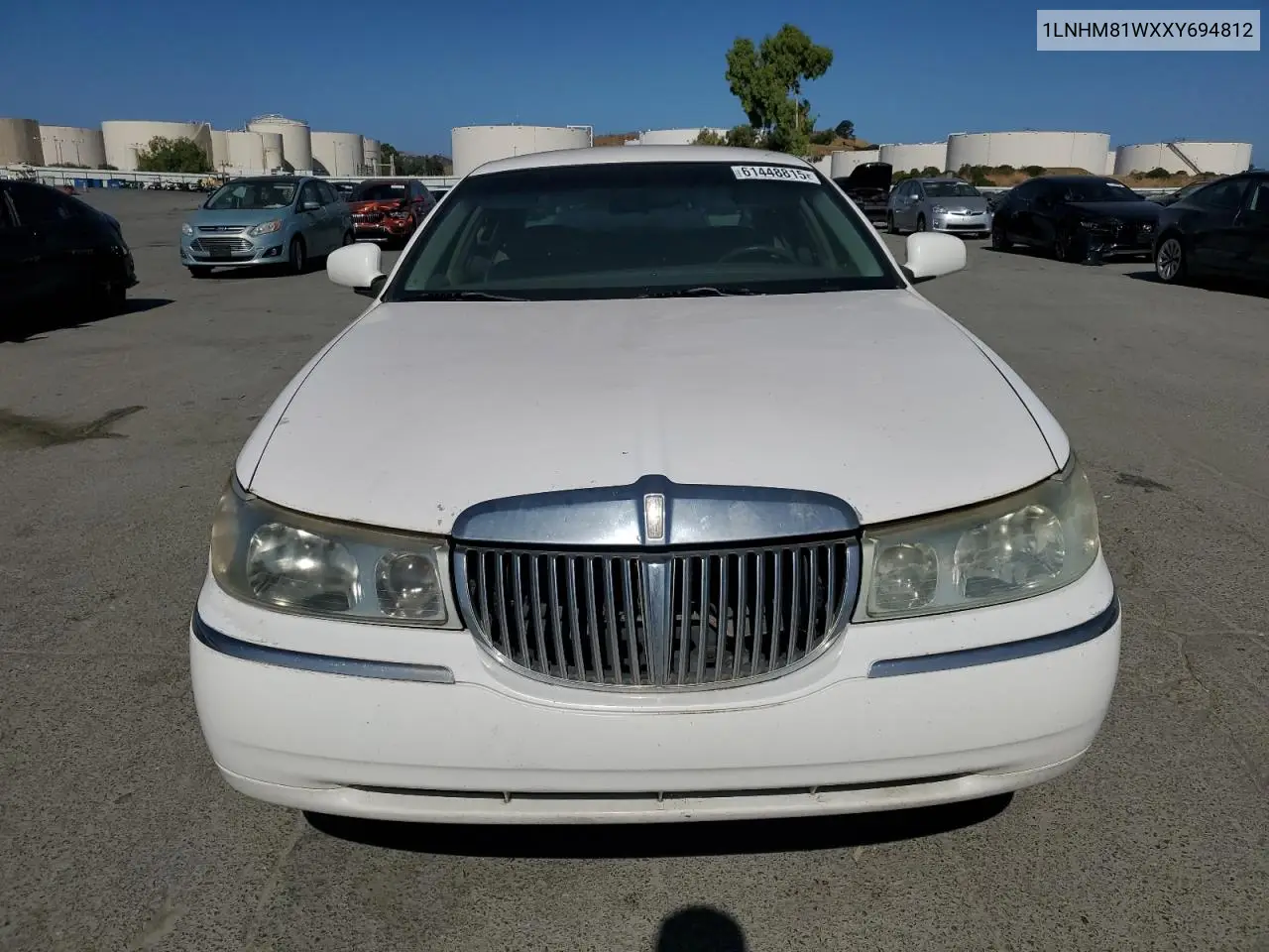 1999 Lincoln Town Car Executive VIN: 1LNHM81WXXY694812 Lot: 61448815
