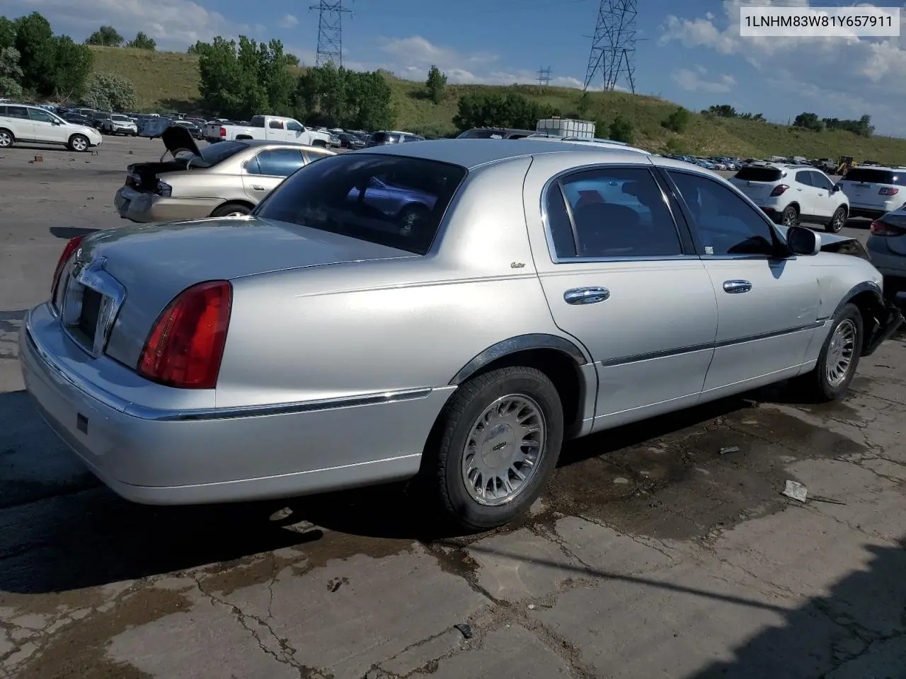 2001 Lincoln Town Car Cartier VIN: 1LNHM83W81Y657911 Lot: 62165335