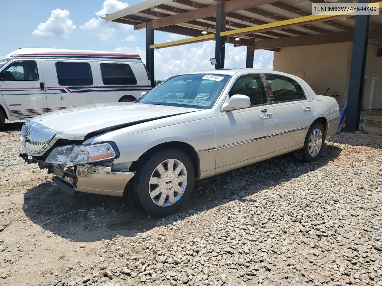 2004 Lincoln Town Car Ultimate VIN: 1LNHM83W74Y644409 Lot: 61958135