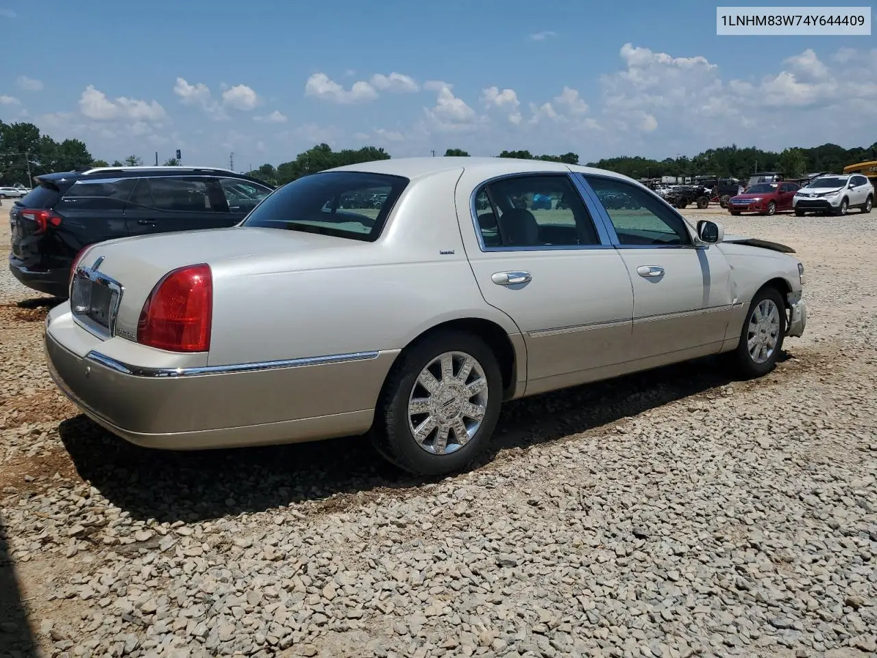2004 Lincoln Town Car Ultimate VIN: 1LNHM83W74Y644409 Lot: 61958135