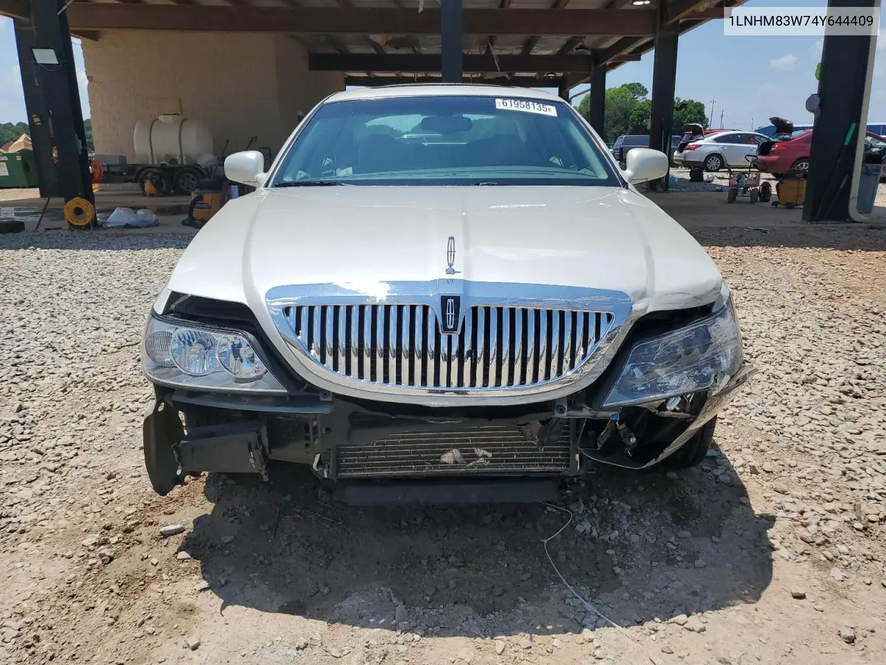 2004 Lincoln Town Car Ultimate VIN: 1LNHM83W74Y644409 Lot: 61958135