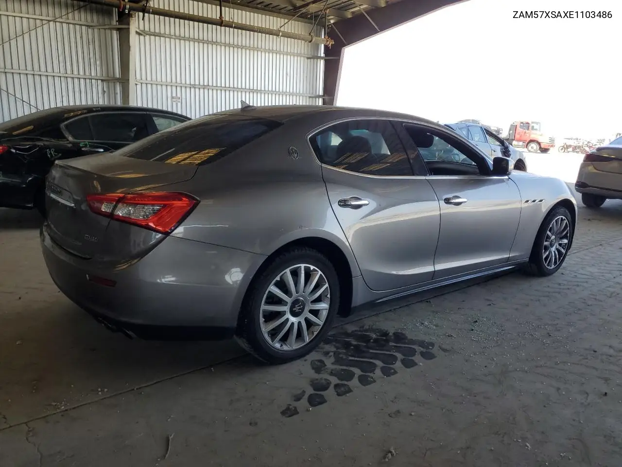 2014 Maserati Ghibli VIN: ZAM57XSAXE1103486 Lot: 61009365