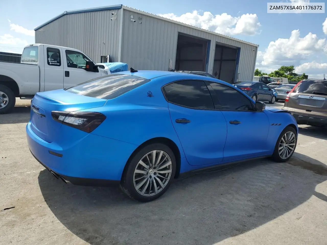2016 Maserati Ghibli VIN: ZAM57XSA4G1176372 Lot: 61860145