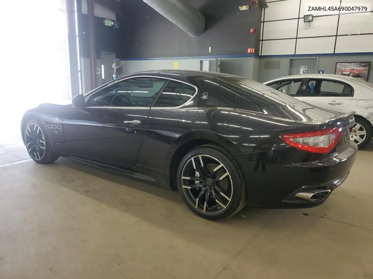 2009 Maserati Granturismo S VIN: ZAMHL45A690047979 Lot: 59949845