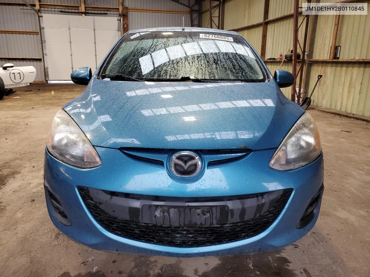 2011 Mazda Mazda2 VIN: JM1DE1HY2B0110845 Lot: 62768885