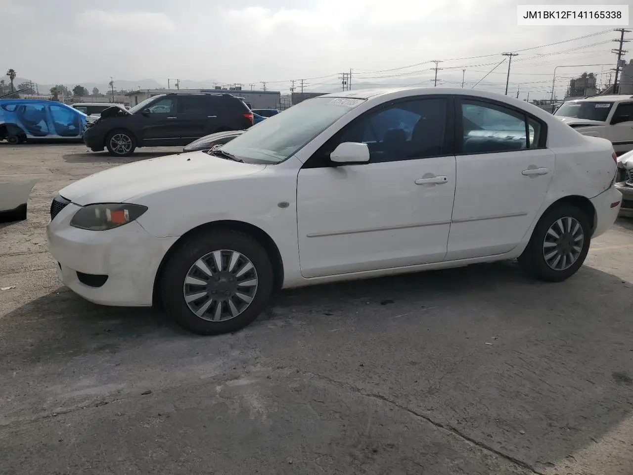 2004 Mazda 3 I VIN: JM1BK12F141165338 Lot: 62572105