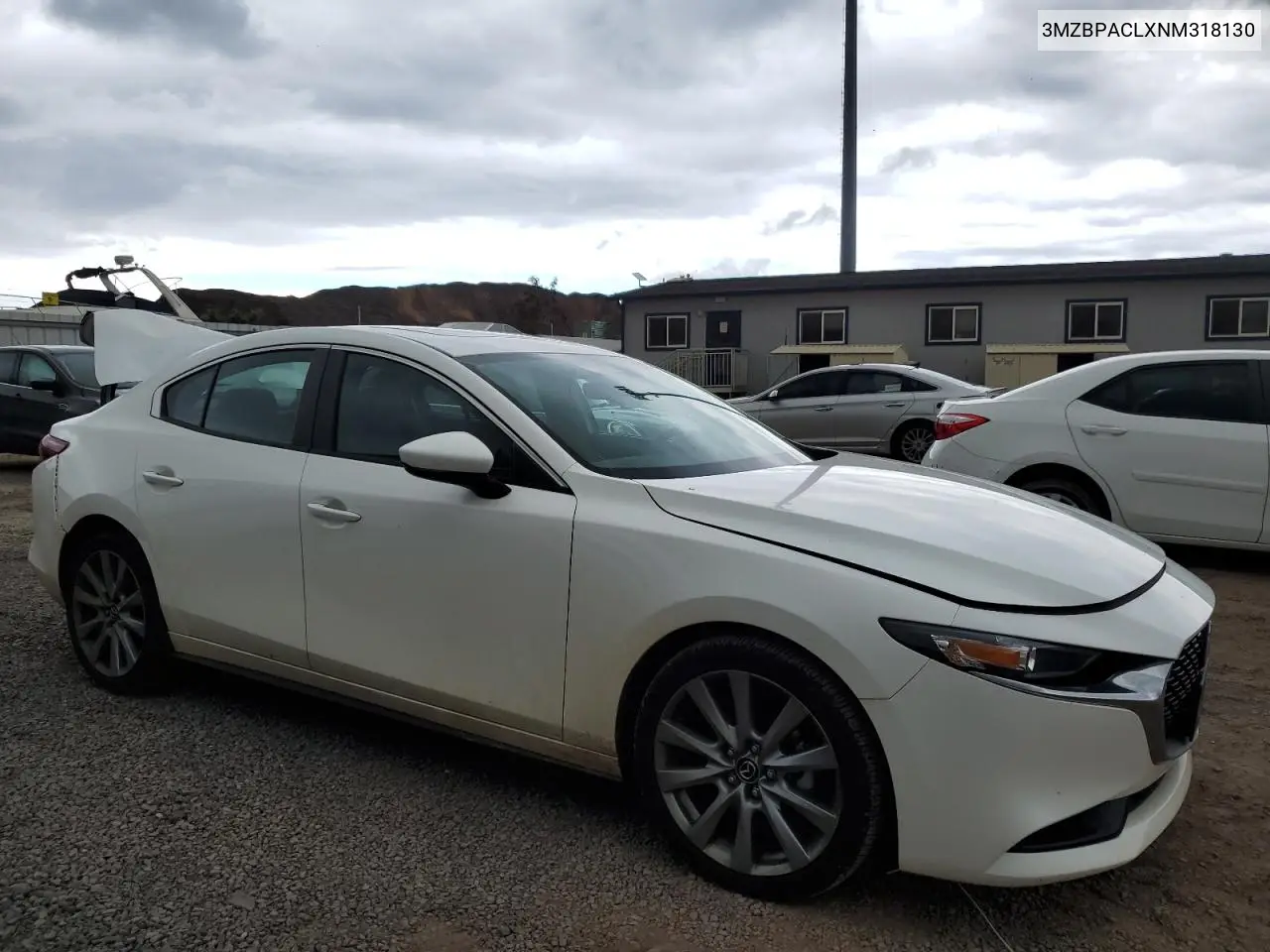 2022 Mazda 3 Preferred VIN: 3MZBPACLXNM318130 Lot: 84111884