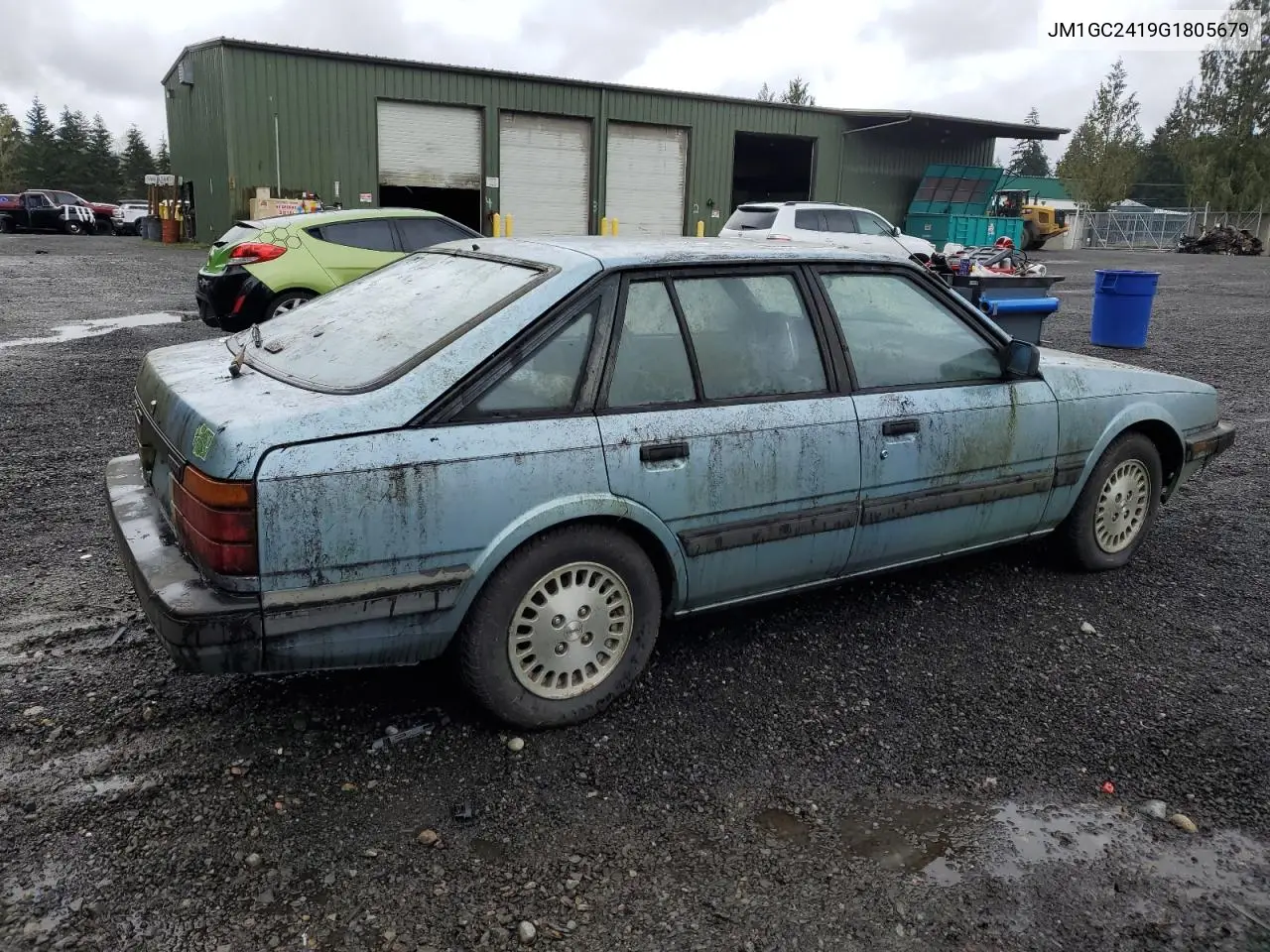 1986 Mazda 626 VIN: JM1GC2419G1805679 Lot: 51294255