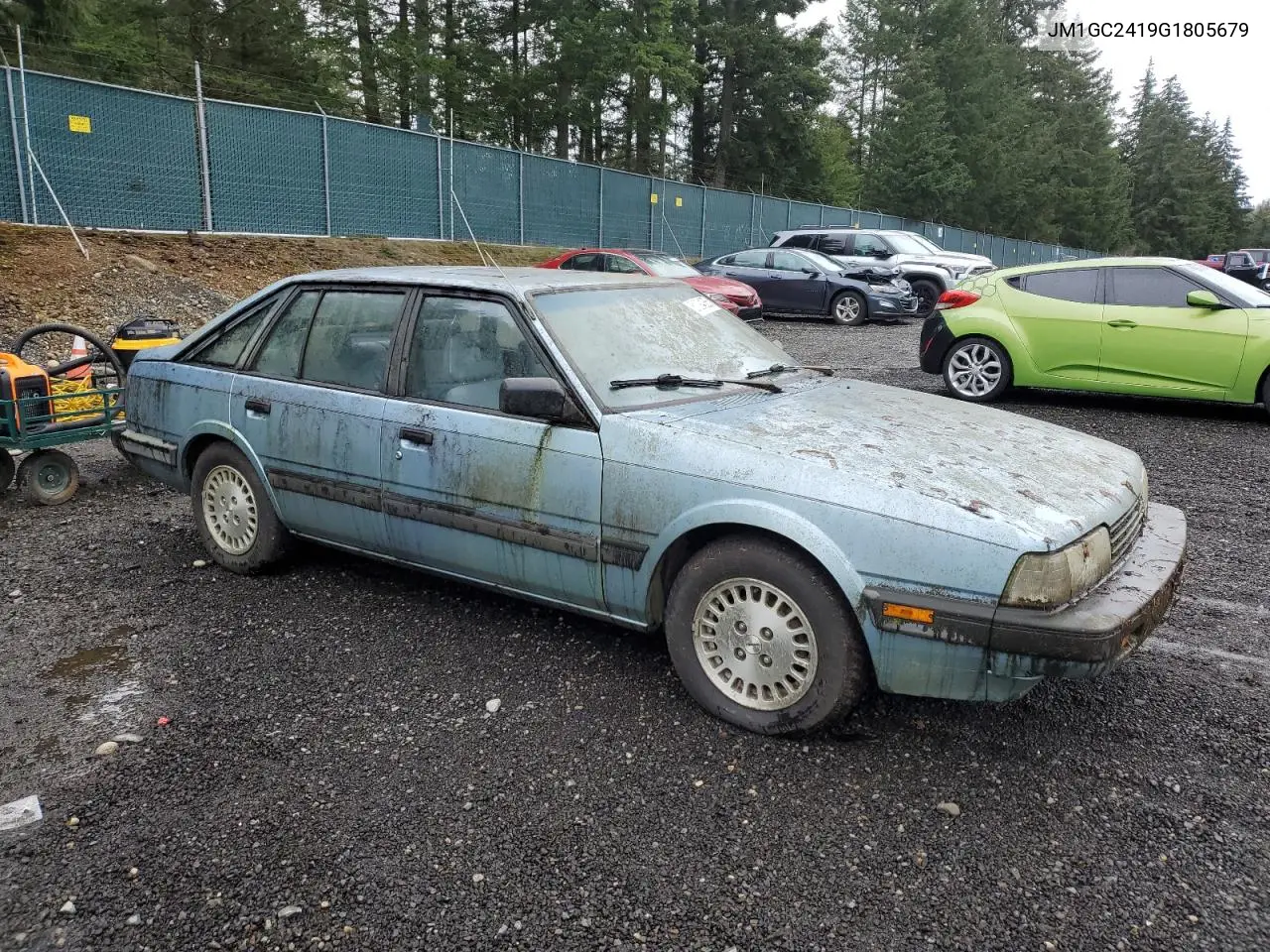 1986 Mazda 626 VIN: JM1GC2419G1805679 Lot: 51294255